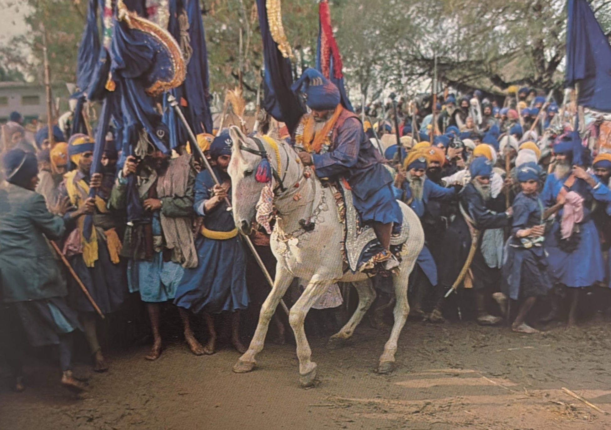 Santa Singh on a white horse reviewing his men