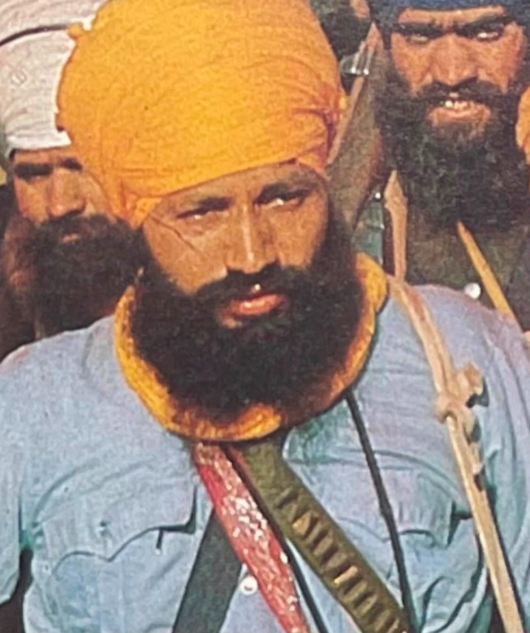 Close portrait of a Nihung Singh with bandolier