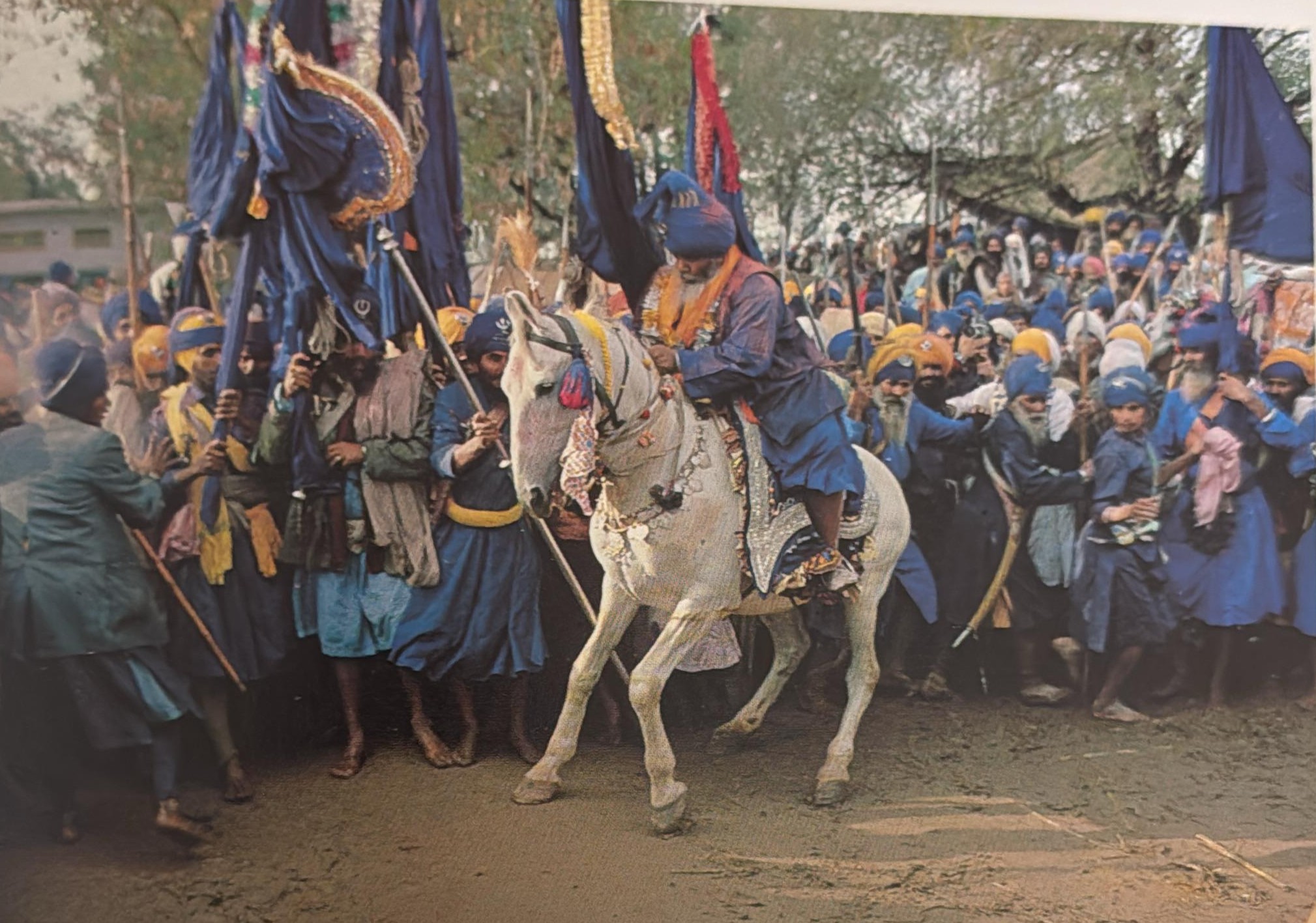 Santa Singh on a white horse reviewing his men